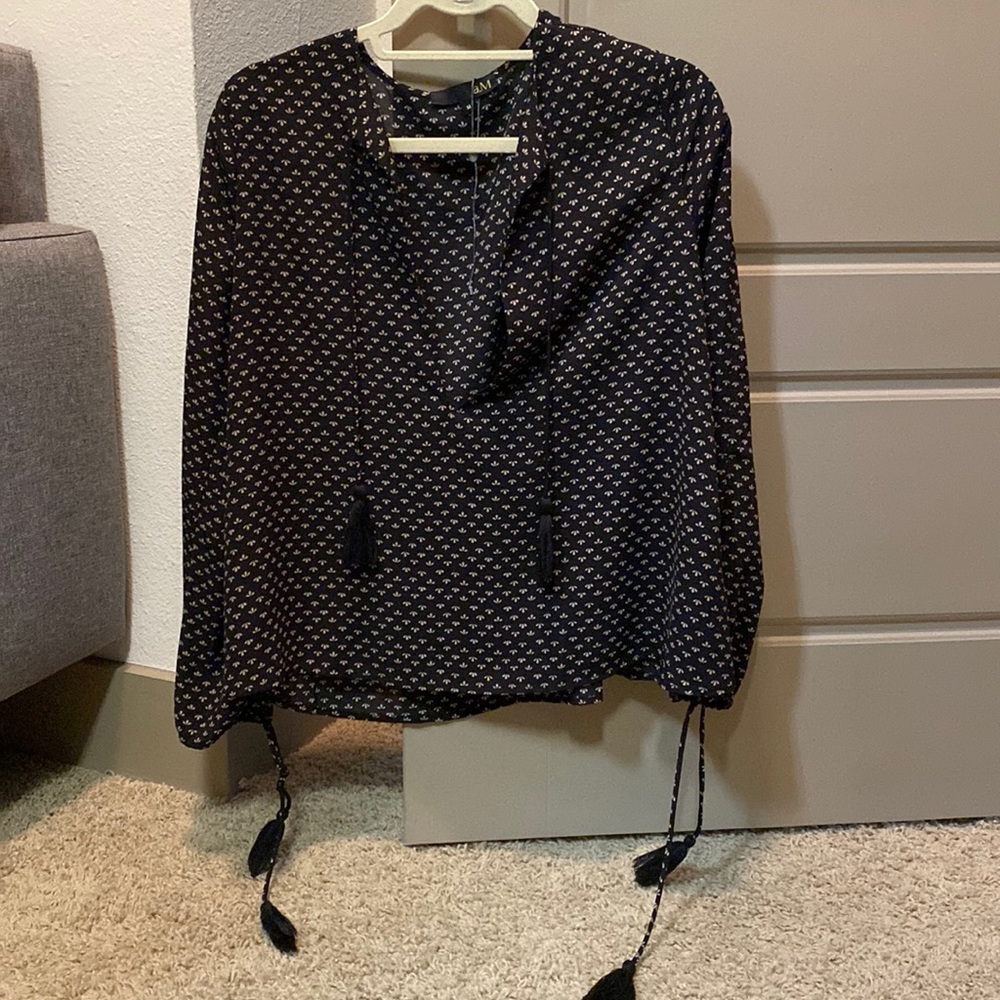 Blouse with tassels